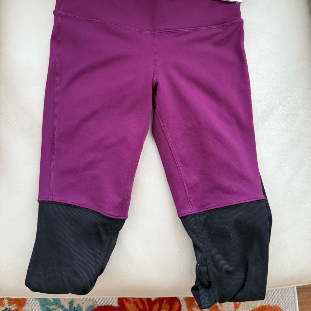 ALO Yoga Women's Goddess Leggings in Purple and Black